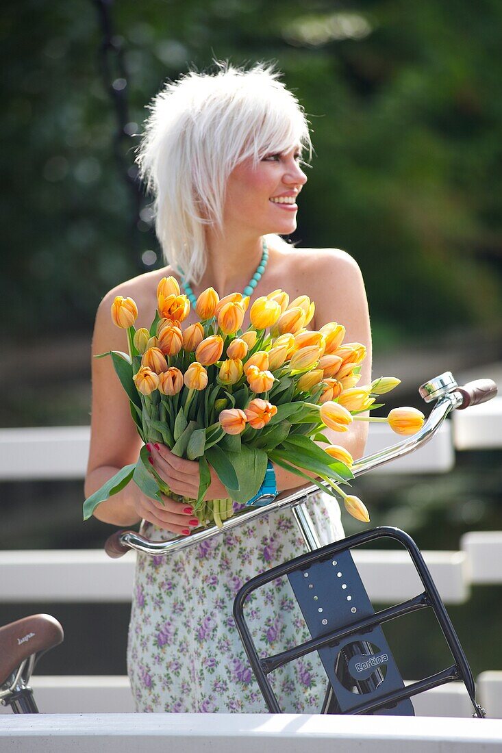 Woman holding tulips