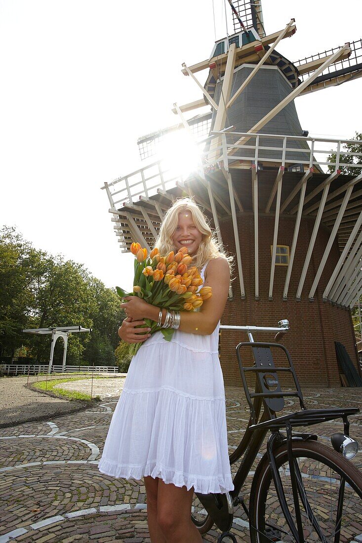 Woman holding tulips