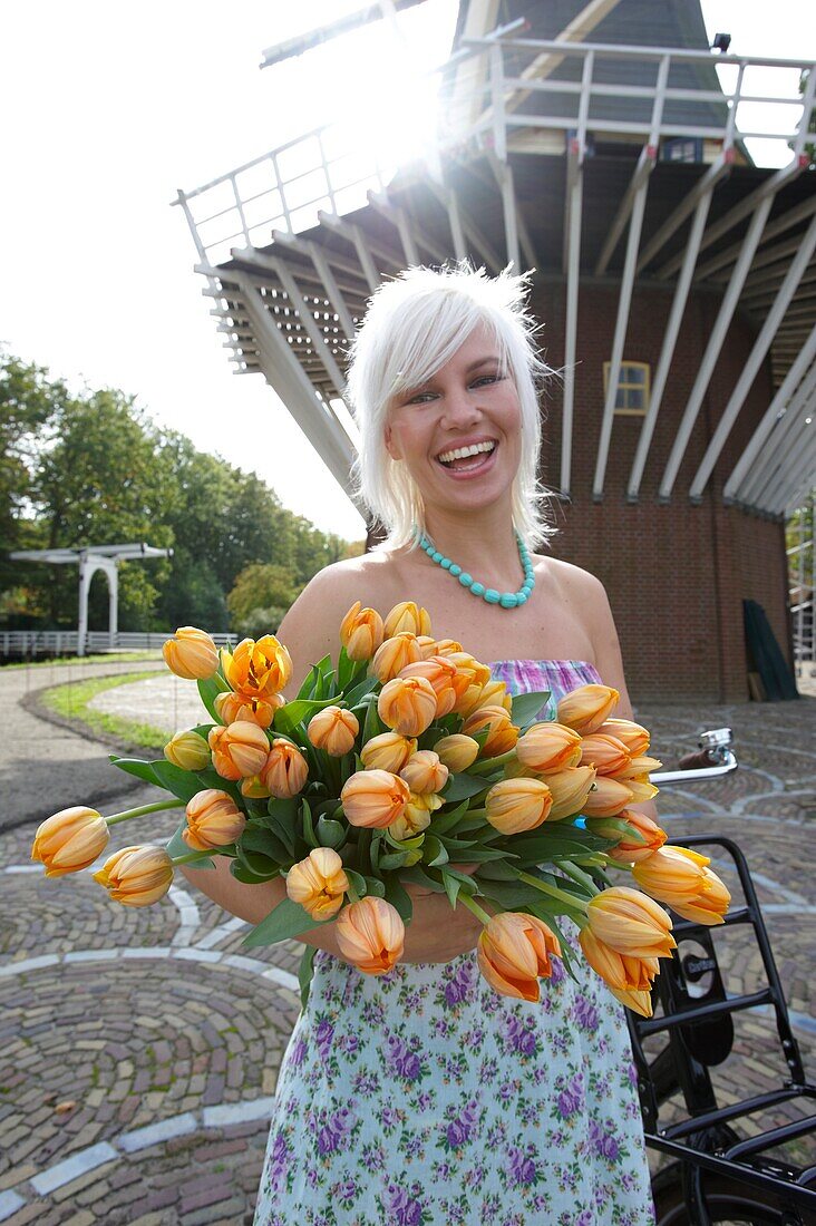 Woman holding tulips