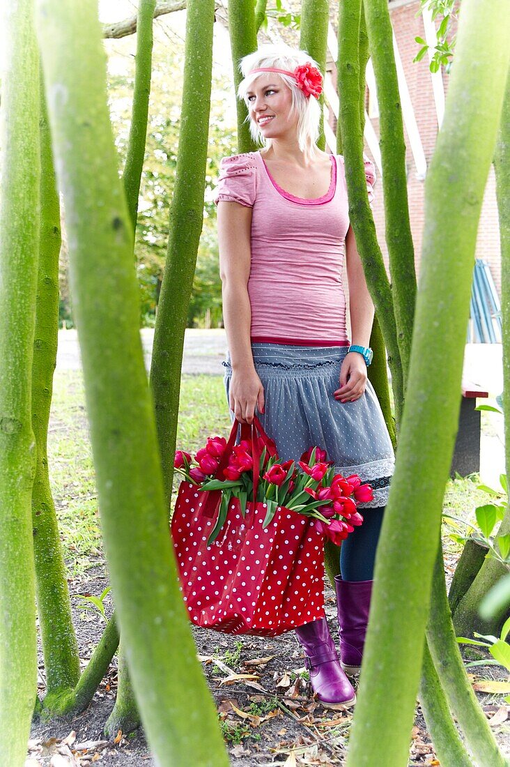 Woman holding tulips