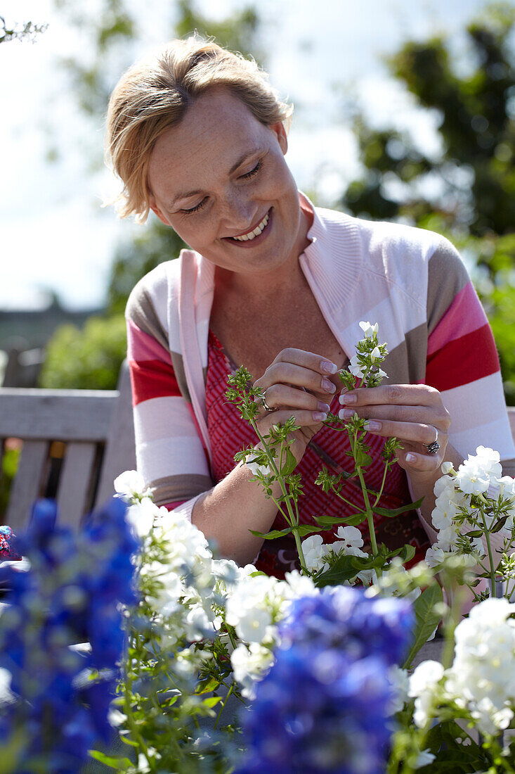 Woman holding phlox