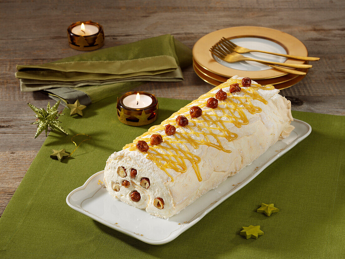 Christmas meringue roulade with caramelised nuts