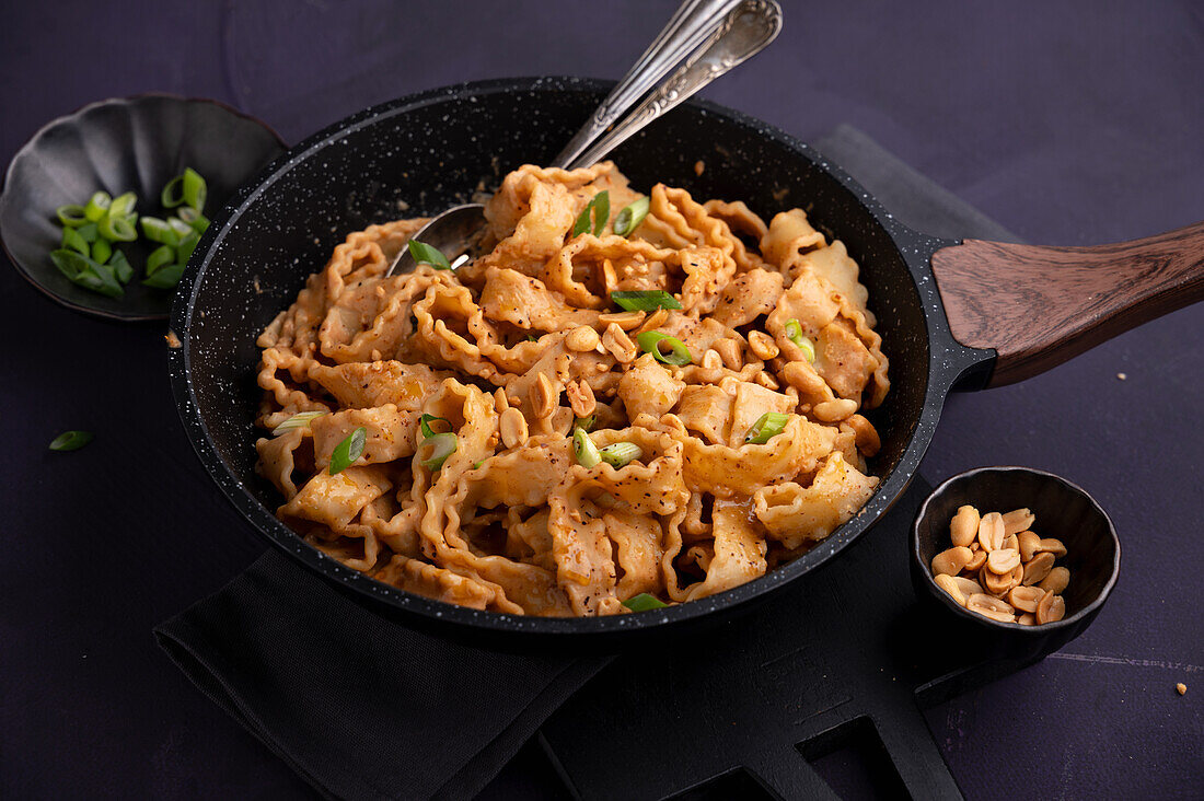 Vegan pasta with creamy peanut sauce