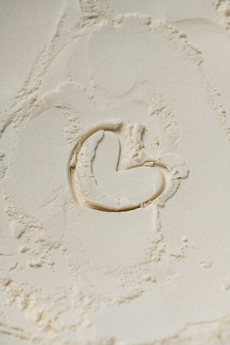 A heart drawn in flour