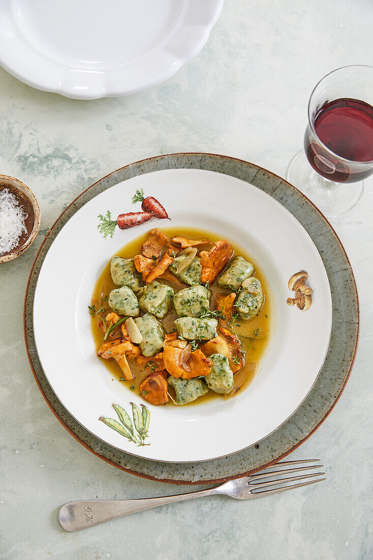 Ricotta and spinach gnudi in mushroom broth