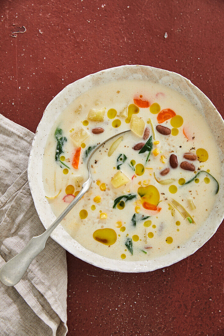 Creamy potato soup with borlotti beans, sweetcorn and pearl barley