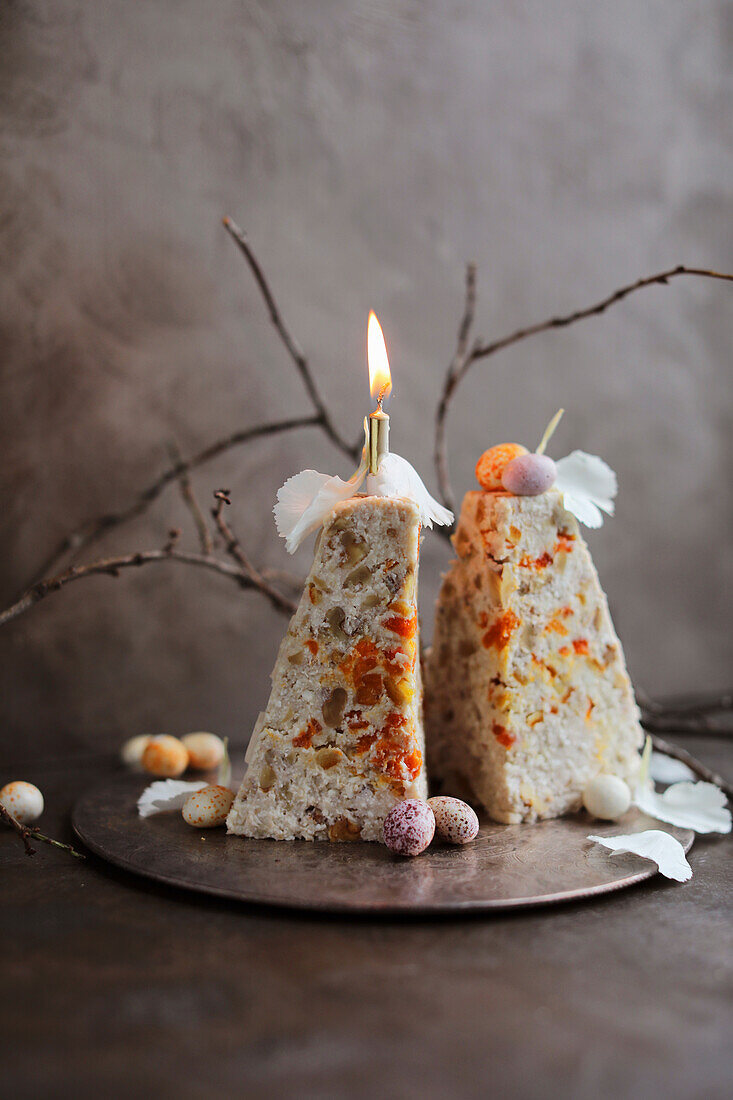 Pashka (Polish Easter dessert) with candle, cut