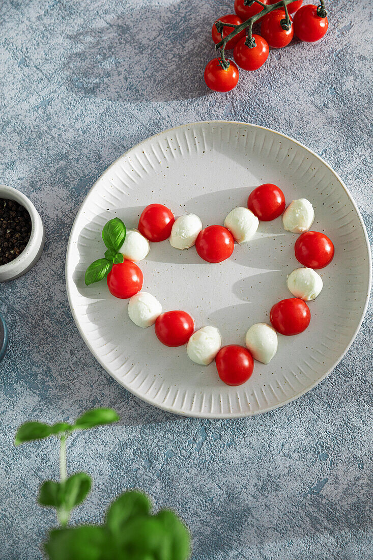 Heart of cherry tomatoes and mini mozzarella