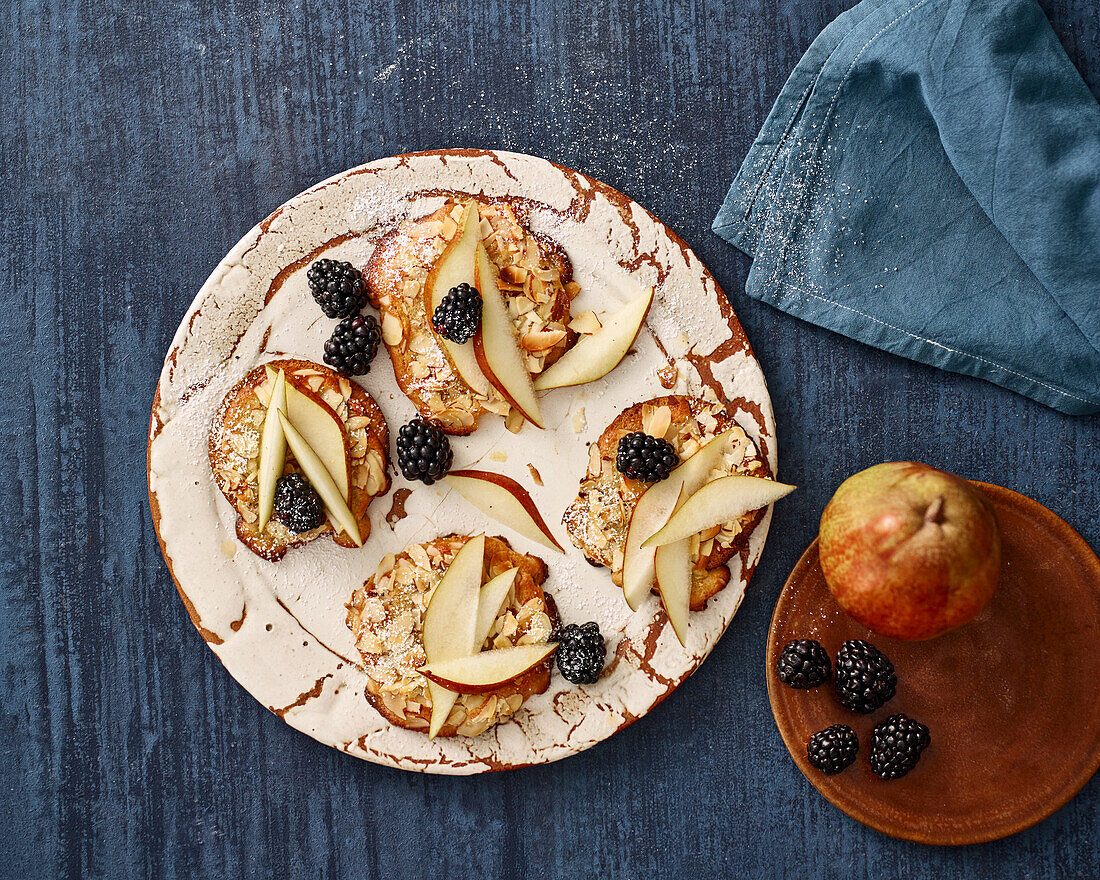 Bostock tartlet with miso almond cream, pears and blackberries