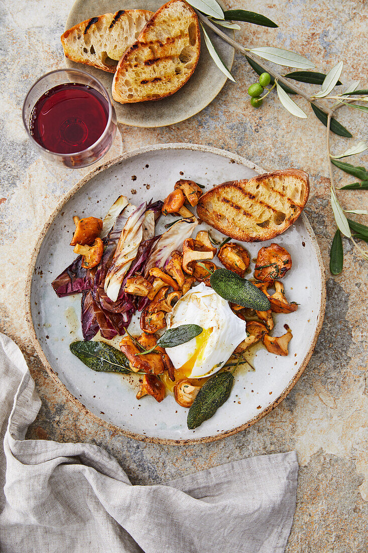 Fried chanterelles and radicchio with poached egg and knob sage