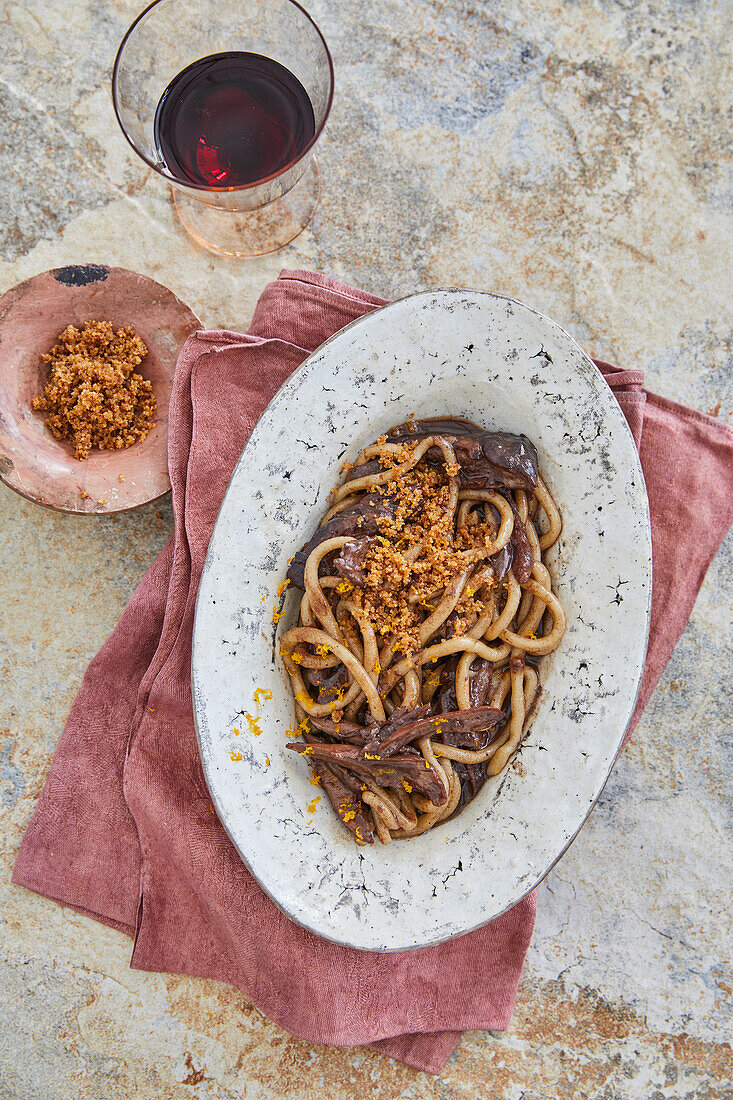 Hand-rolled pici with red wine duck ragout