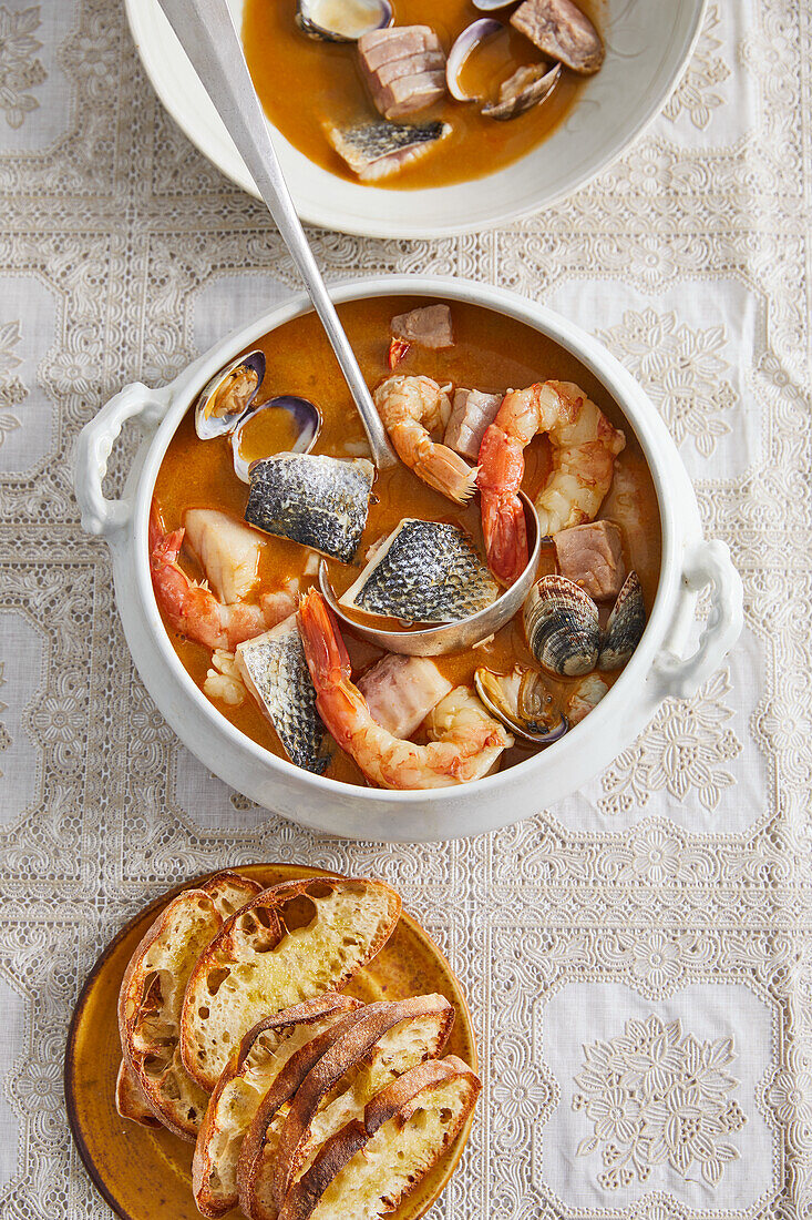 Cacciucco from Livorno (fish soup with crostini)