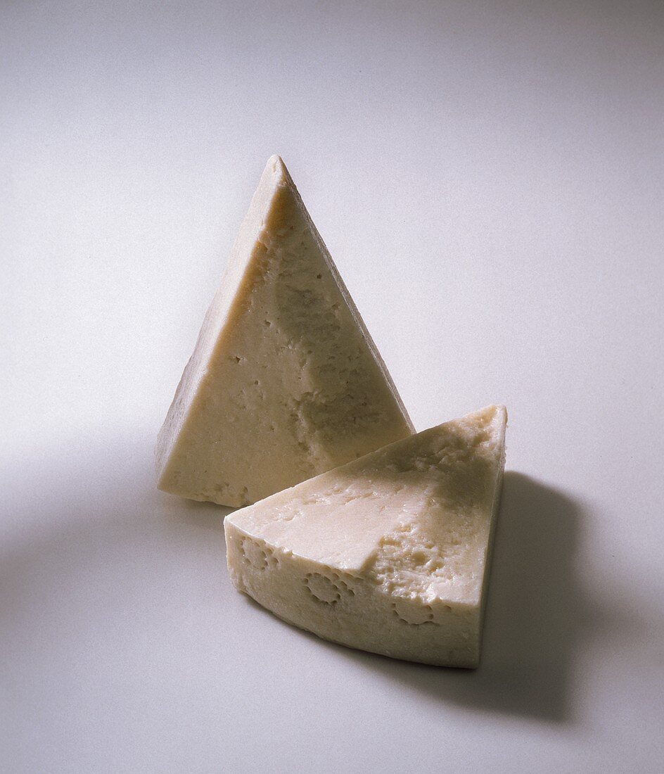 Two pieces of Pecorino Romano Gold (Italian hard cheese)