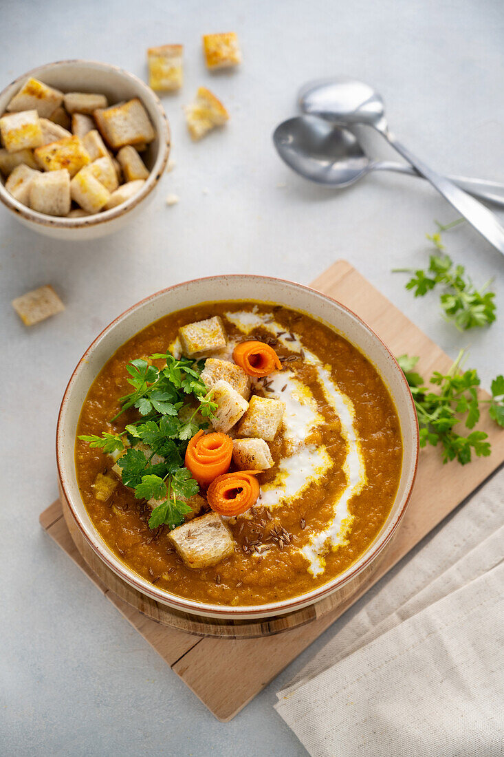 Creamy carrot soup with croutons