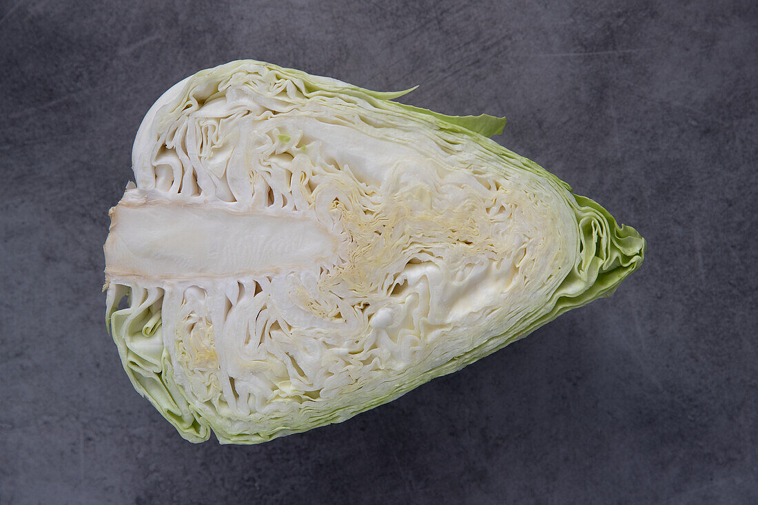Green pointed cabbage cut in half