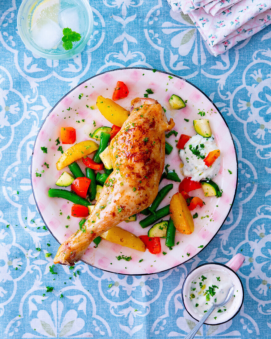Chicken thighs with yoghurt dip and Mediterranean vegetables