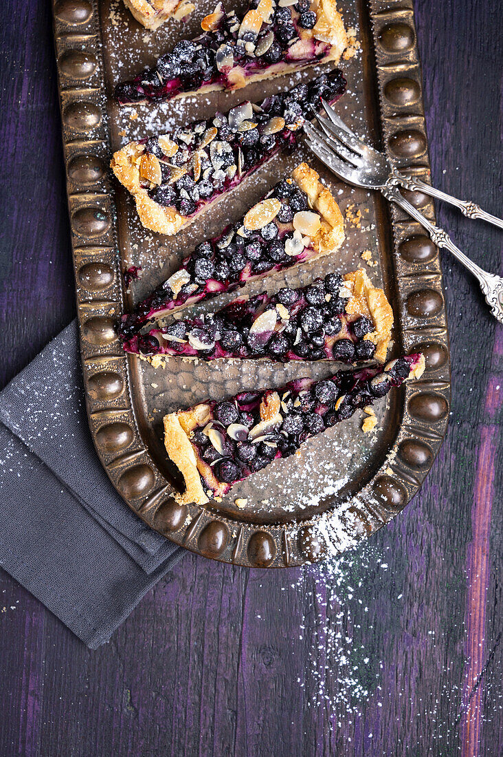 Vegan blackcurrant and cheese tart with almonds