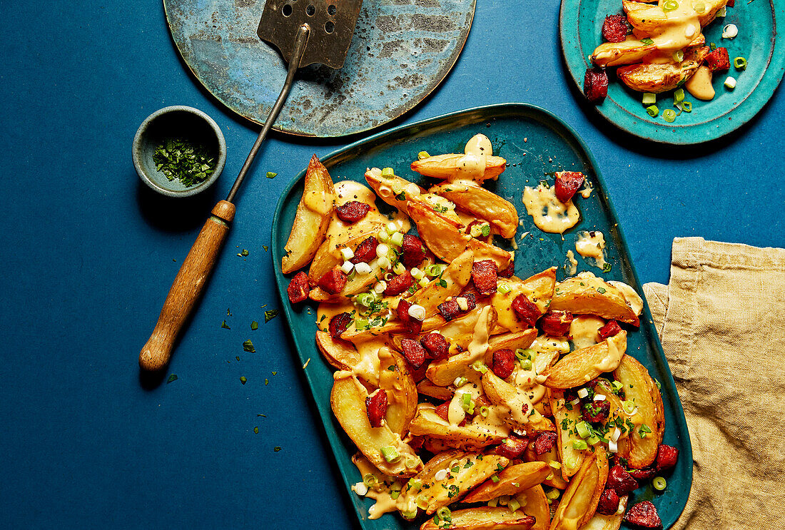 Jacket potatoes with chorizo, chilli flakes and cheese