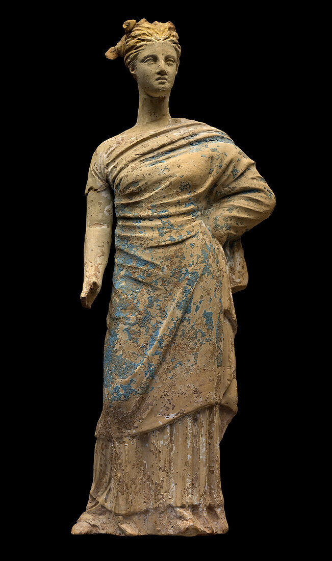 Tanagra painted terracotta statuette.