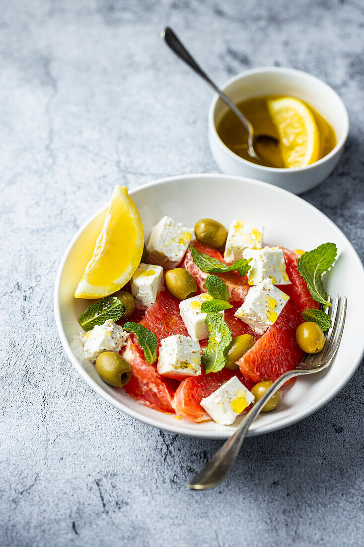 Grapefruit salad with feta and green olives