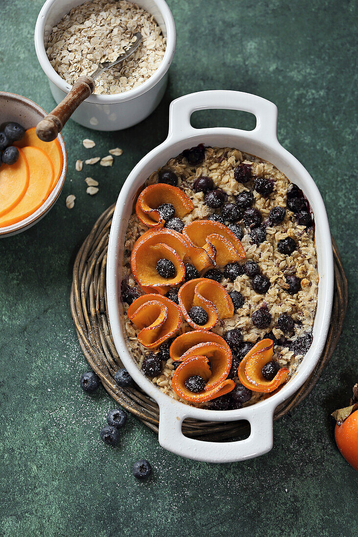 Persimmon and blueberry oatmeal from the oven