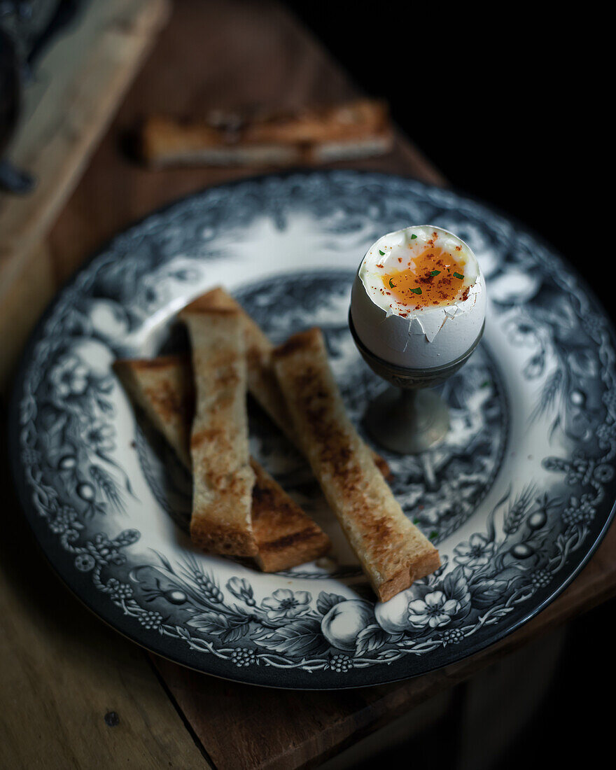 Soft-boiled eggs with toast strips for dipping