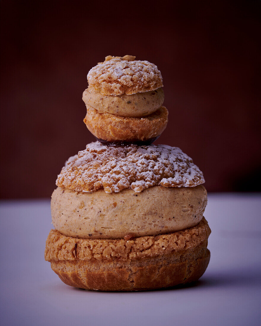 Religieuses with nut cream and crumble