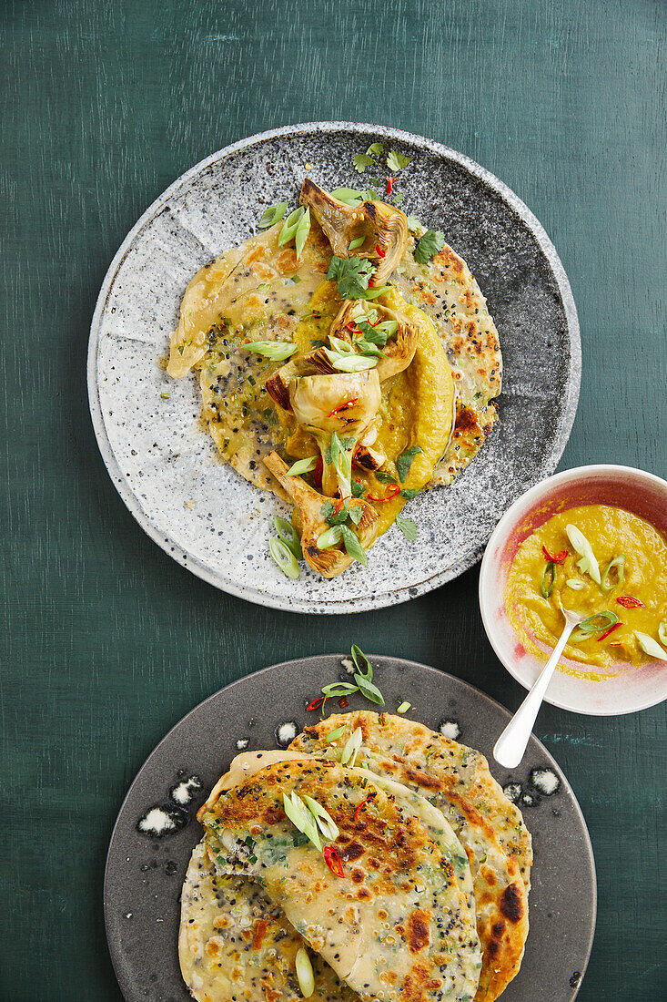 Sesame pancakes and artichokes with onion dip