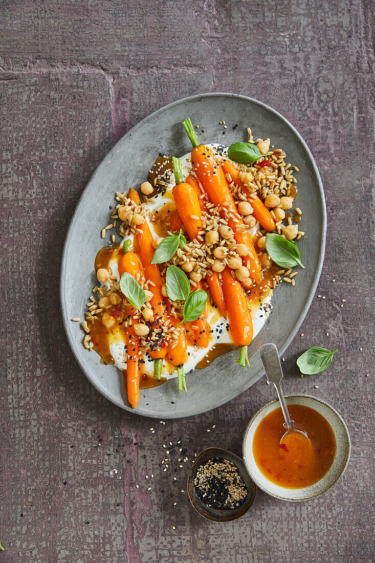 Marinated carrots with oats, yoghurt and sea buckthorn chilli sauce