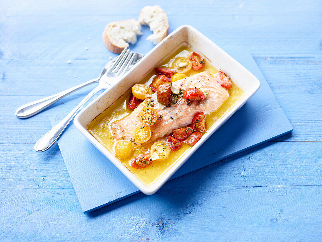 Oven-baked salmon with cherry tomatoes