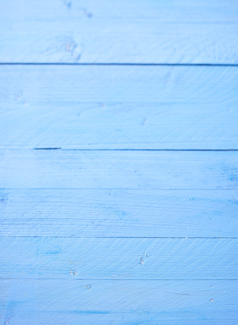 Light blue wooden background