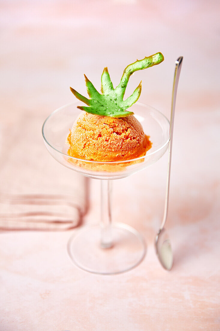 Tomato ice cream with olive oil and lemon verbena, green leaf hips with basil