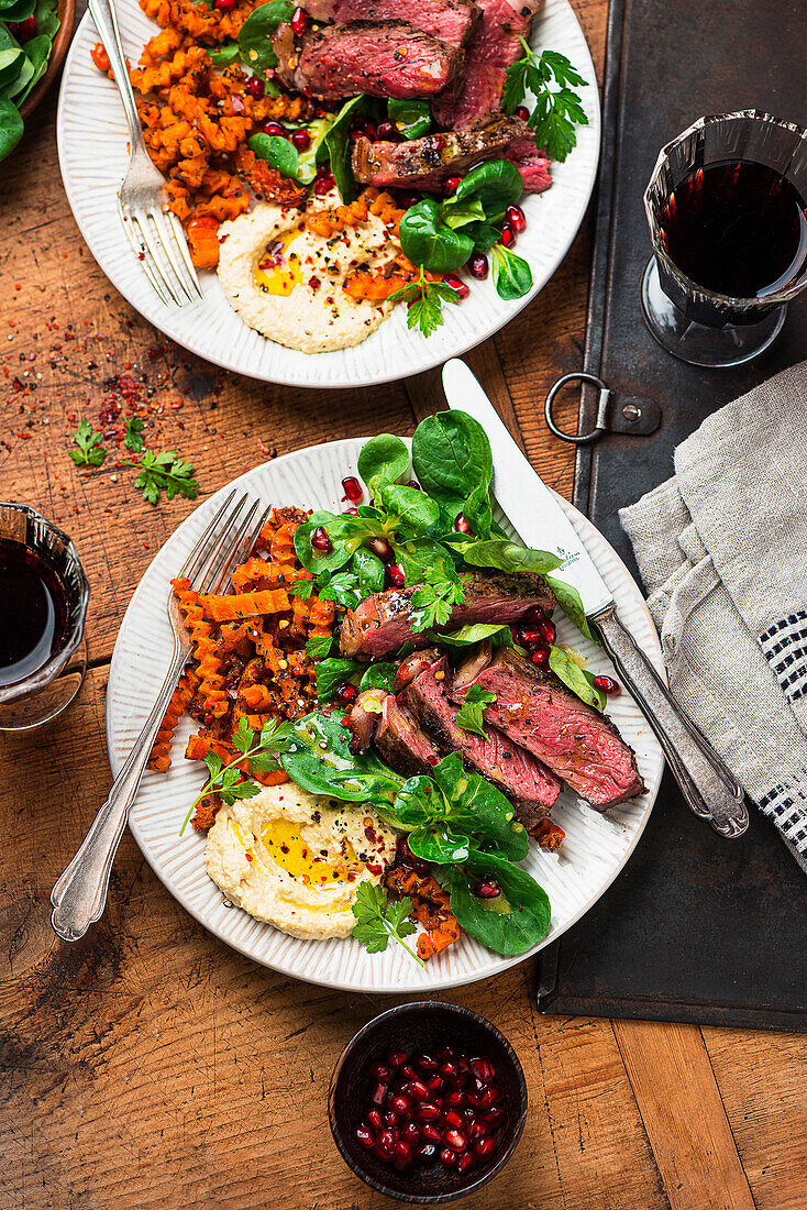 Savoury steak with pumpkin fries and hummus