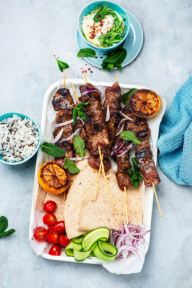 Souvlaki skewers with tzatziki and rice