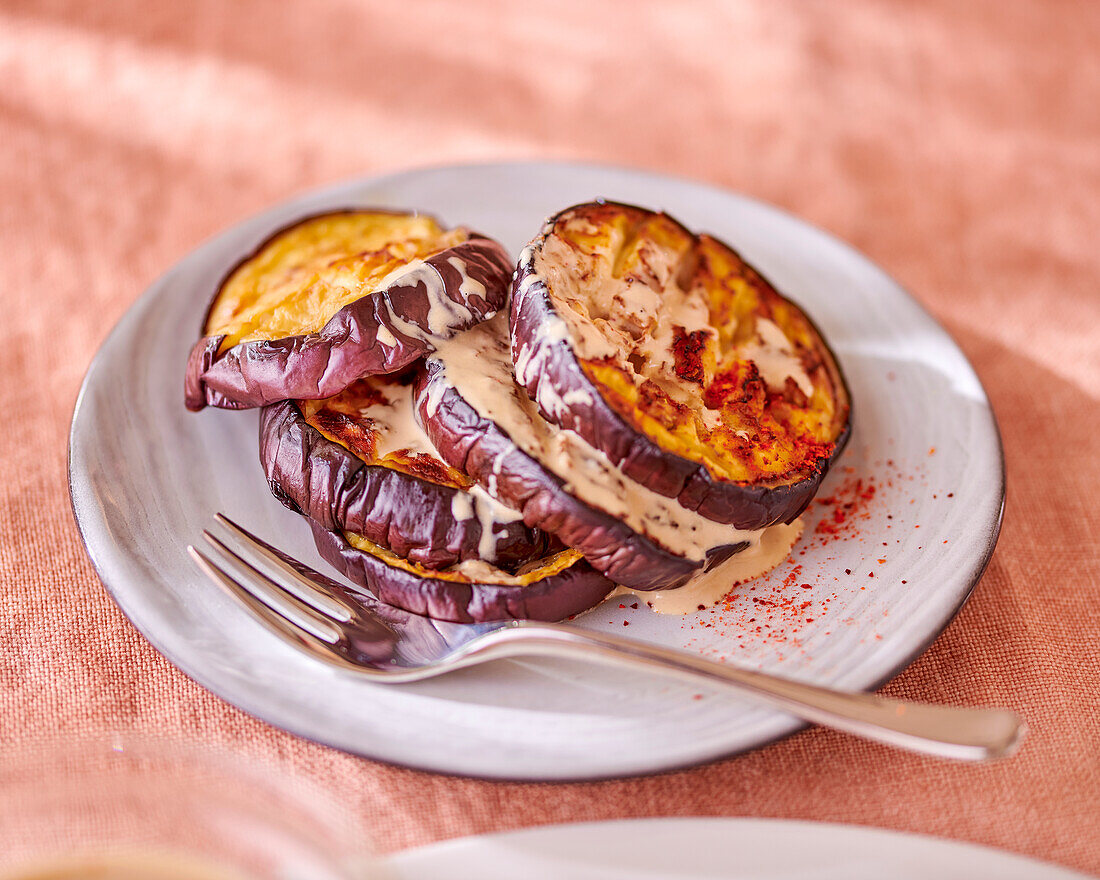 Roasted aubergines with tahini dressing