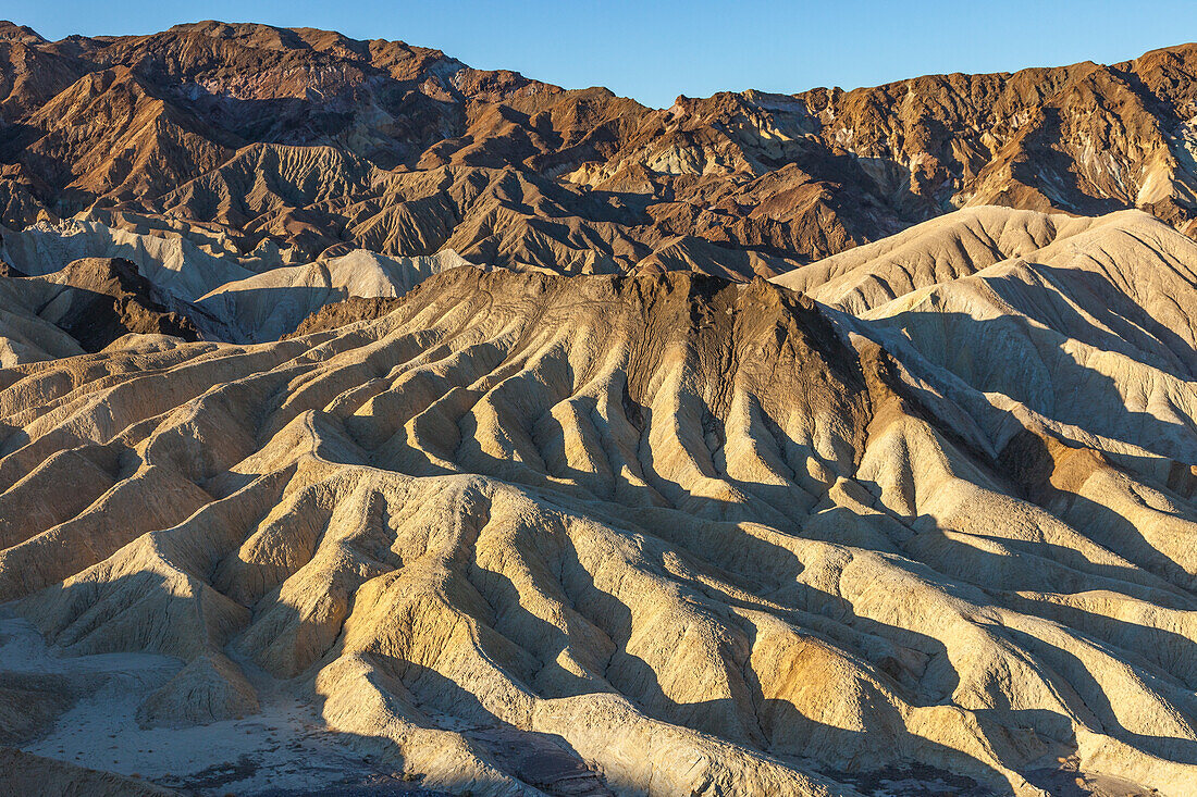 Eroded badlands of the Furnace Creek Formation at Zabriskie Point in Death Valley National Park in California.