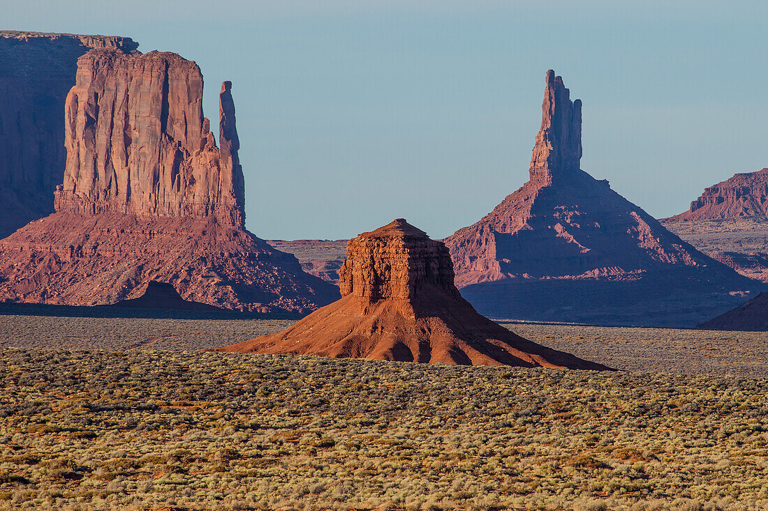 The Hub or Wagon Wheel Butte in front of the West Mitten & Big Indian Chief in the Monument Valley Navajo Tribal Park in Arizona.