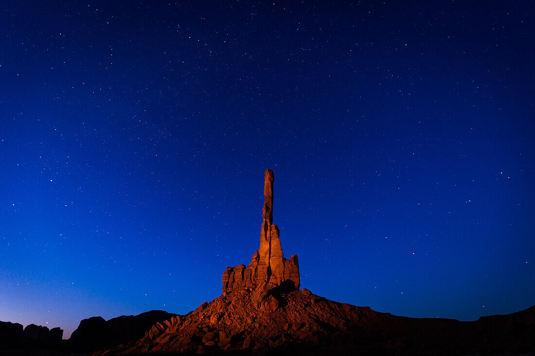 Stars over the Totem Pole at night in the Monument Valley Navajo Tribal Park in Arizona.