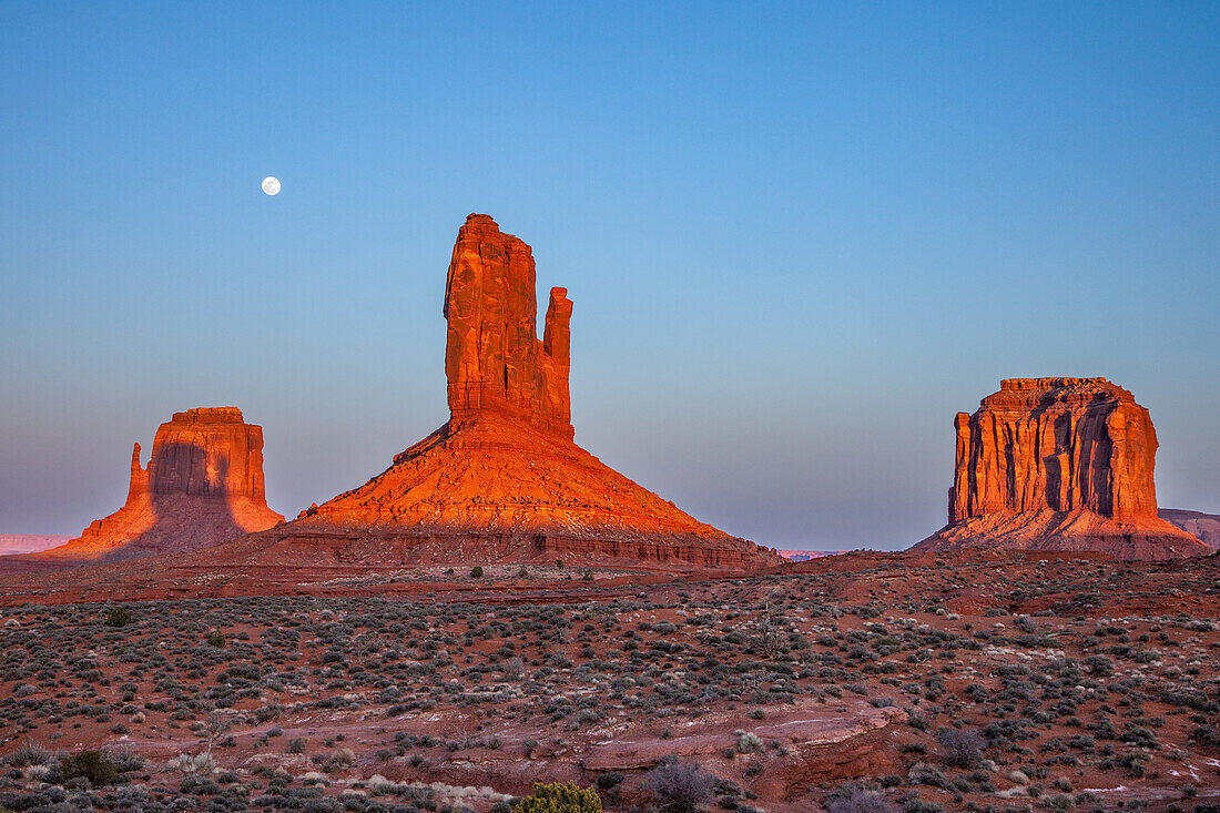 Shadow of the West Mitten projected onto the East Mitten at sunset in the Monument Valley Navajo Tribal Park in Arizona. This phenomenon occurs twice per year.