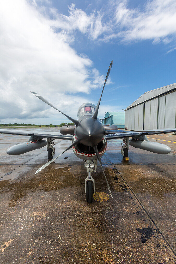 A Dominican Air Force Embraer EMB 314 Super Tucano fighter aircraft at the San Isidro Air Base in the Dominican Republic.