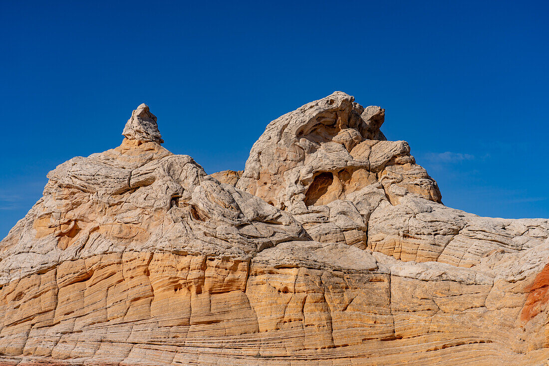 A teepee-shaped sandstone rock formation in the White Pocket Recreation Area, Vermilion Cliffs National Monument, Arizona.