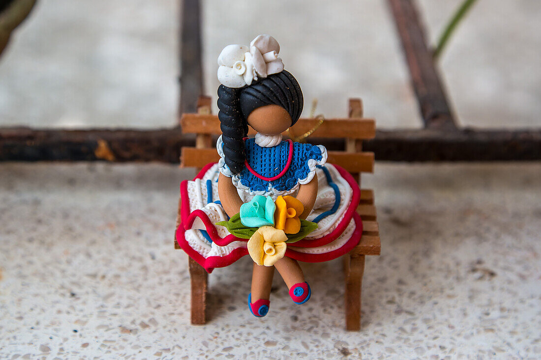 A Dominican faceless doll in a home workshop in the Dominican Republic. The faceless dolls represent the ethnic diversity of the Dominican Republic.