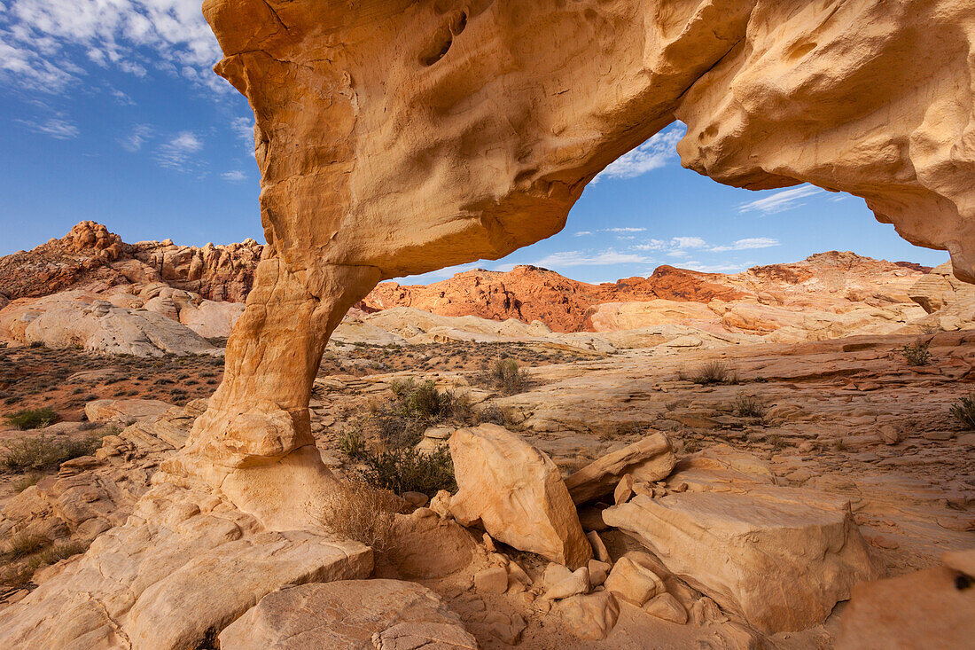 An unnamed natural arch in the eroded Aztec sandstone of Valley of Fire State Park in Nevada.