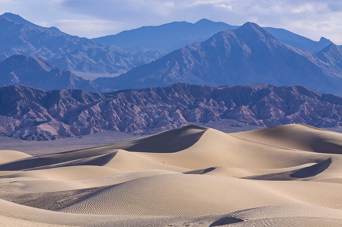Mesquite Flat sand dunes in Death Valley National Park in the Mojave Desert, California. Black Mountains behind.