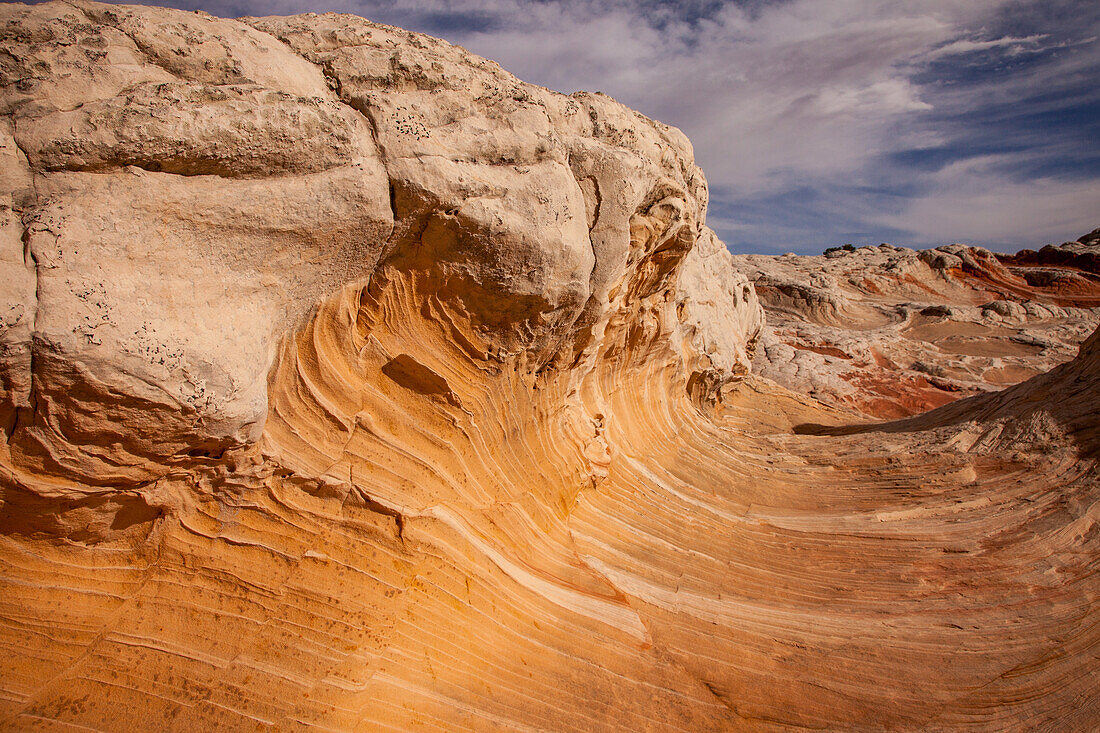 Colorful eroded Navajo sandstone in the White Pocket Recreation Area, Vermilion Cliffs National Monument, Arizona. Displaced fault lines are evident in the pattern.