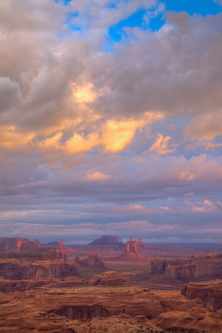 Colorful stormy clouds at sunrise in Monument Valley Navajo Tribal Park in Arizona. View from Hunt's Mesa.