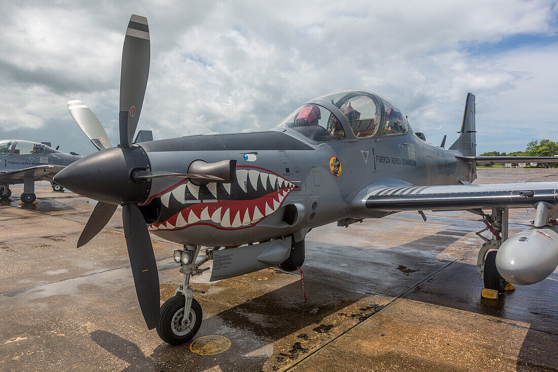 A Dominican Air Force Embraer EMB 314 Super Tucano fighter aircraft at the San Isidro Air Base in the Dominican Republic.