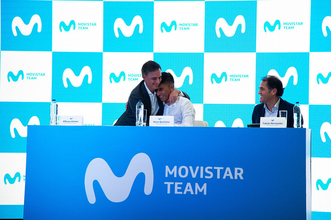 Alfonso Gomez the CEO of Telefonica Hispam (L), cyclist Nairo Quintana (C) and Fabian Hernandez CEO of Movistar Colombia (R), speak during a press conference announcing it's return to the Movistar Cycling team, in Bogota, Colombia on october 30, 2023.