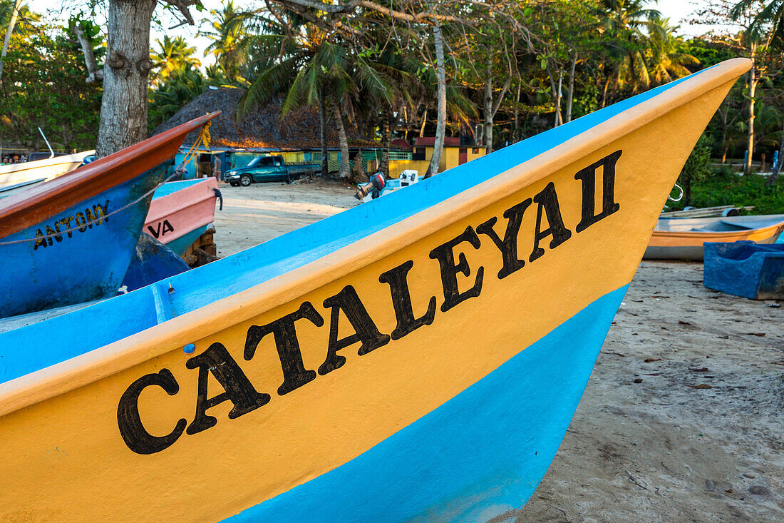 Fishing boats on the beach at Bahia de Las Galeras on the Samana Peninsula, Dominican Republic.