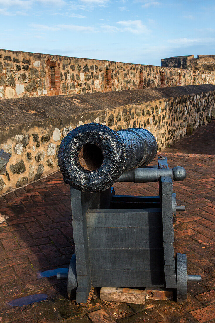 A colonial Spanish cannon on a wooden gun carriage at Fortaleza San Felipe, now a museum at Puerto Plata, Dominican Republic.